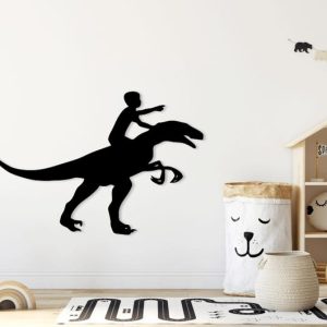 תמונת בחיתוך לייזר- ילד עם דינוזאור